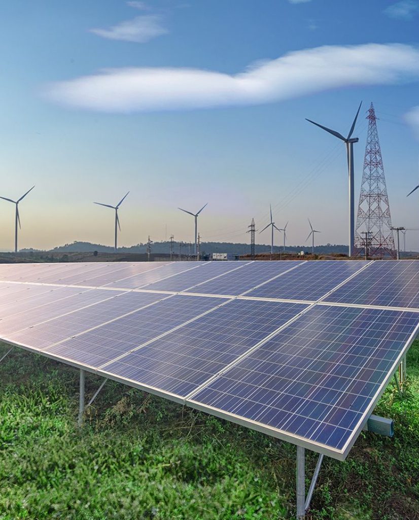 renewable energy solar panels wind turbines green grass blue sky renewable energy solar panels wind turbines green grass blue sky